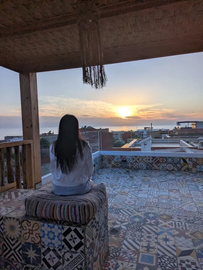 A terrace looking out over the Atlantic — Mouhou House surf stay, Taghazout